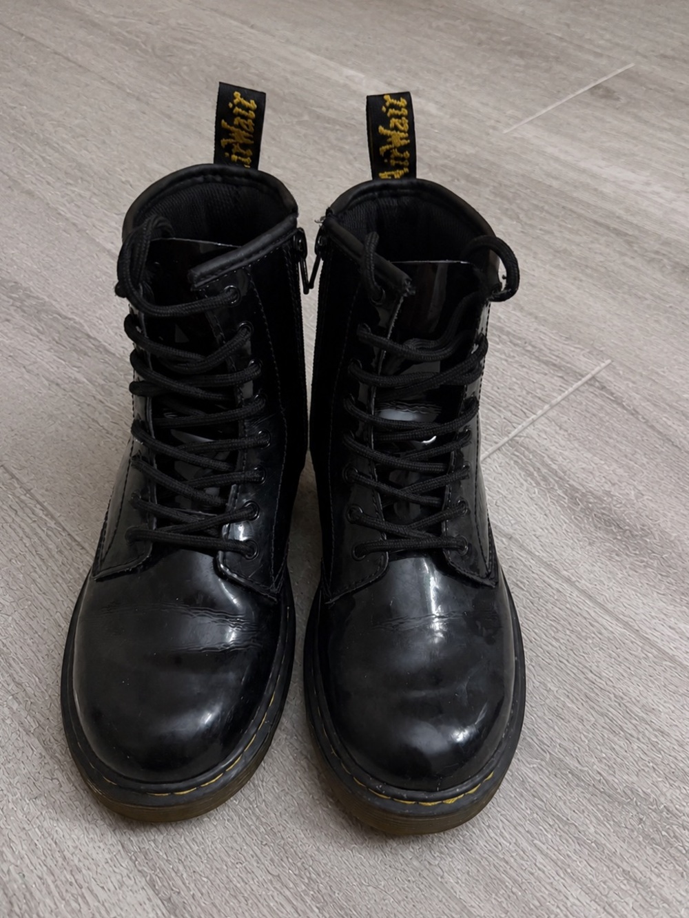 Dr. Martens Black Lace-Up Kids Combat Boots with Yellow Stitching